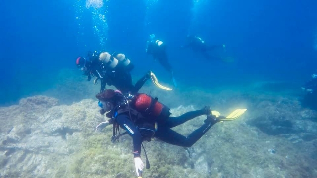 Inmersión en aguas abiertas Scuba Diver 
