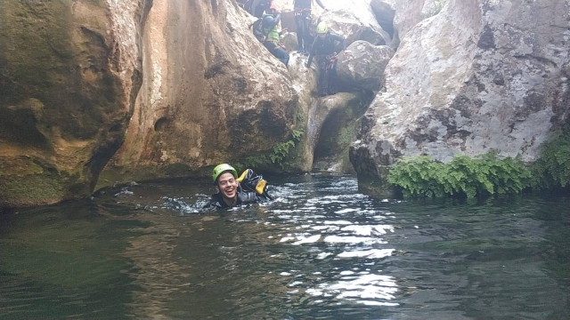 Practicing canyoning in a Mallorcan ravine 