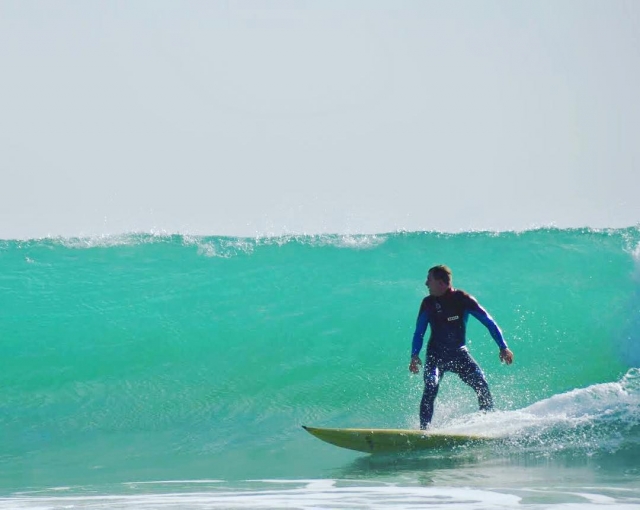  Catching waves at Los Balnearios Beach 