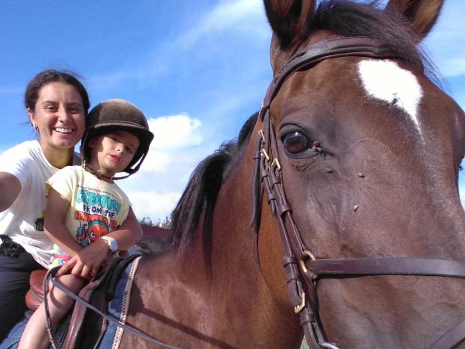 On horseback with the kids On horseback with the kids