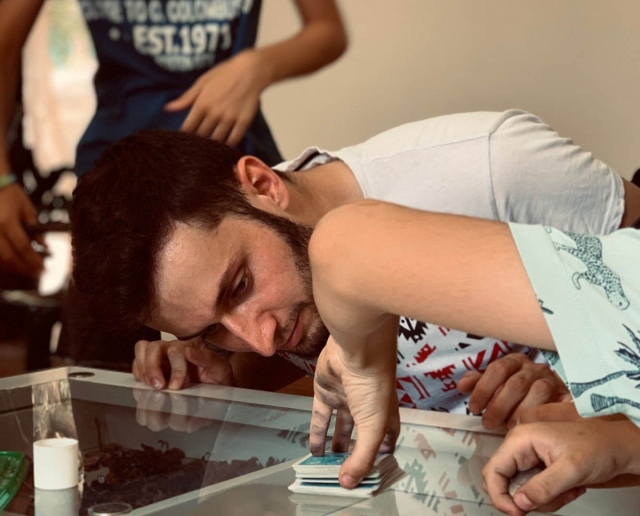  O mágico com seus alunos 