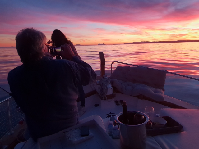  Couple at sunset on the boat 