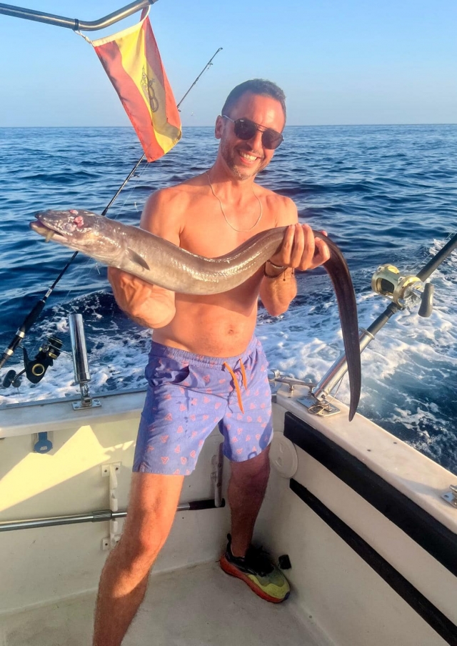  With his catch 