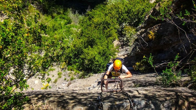  Climbing the wall via the ferrata clamps 