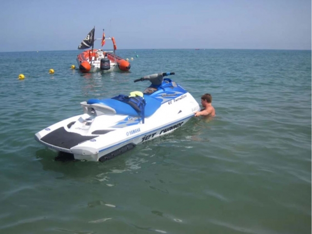  Jet ski next to the boat 
