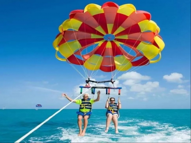 Taking off with the parascending over the sea 