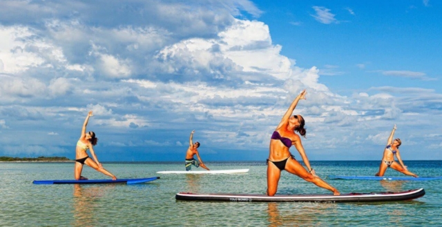 SUP yoga students during class 