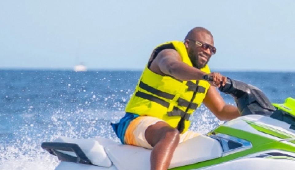  enjoying the good weather on a water pass from a jetski