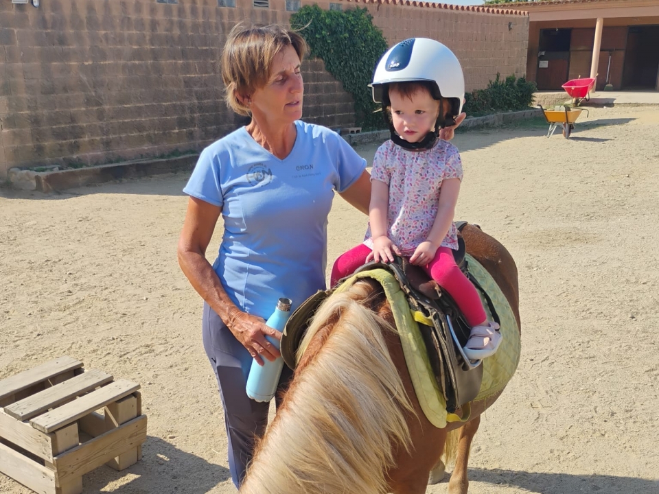  Pony ride through the equestrian center 