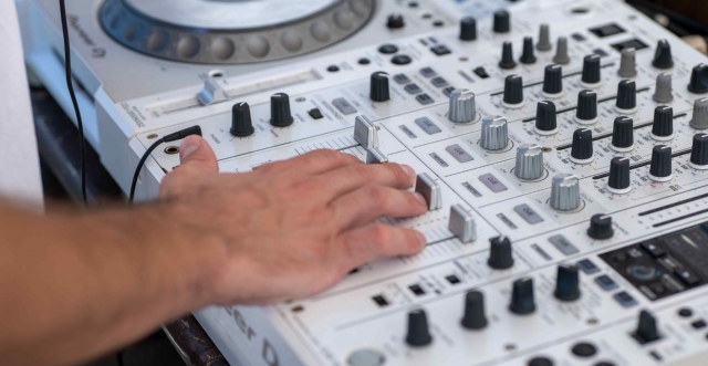  Our DJ playing the mixing table 