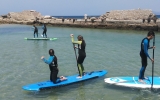 Clase grupo iniciación paddle surf niño Tarifa, 2h