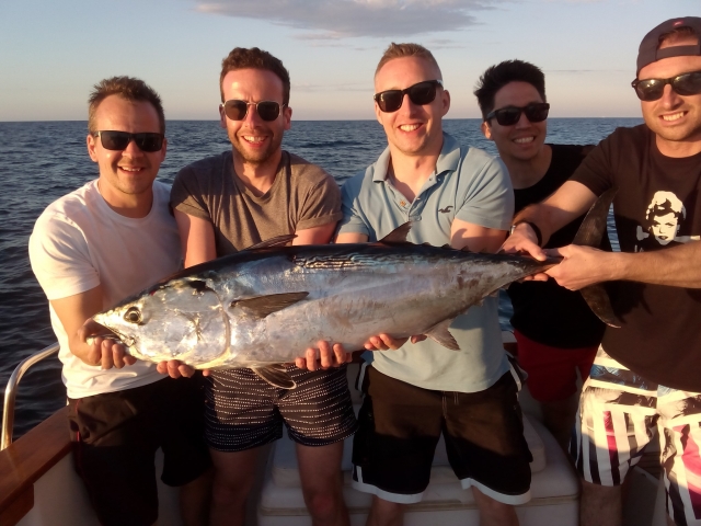  with large fish in the hands 