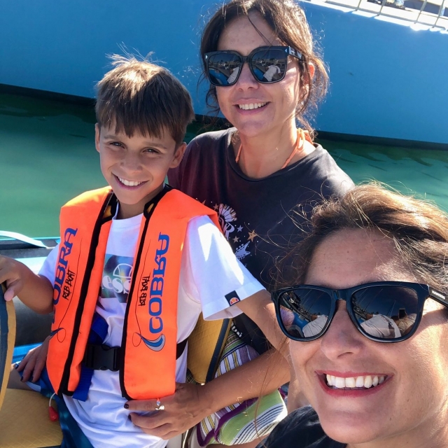 Happy family on the boat route 