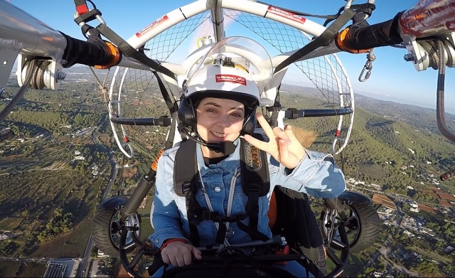  Girl flying on a paramotor 