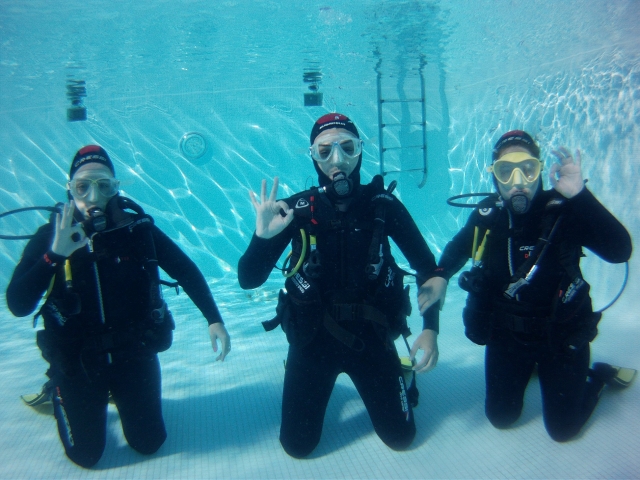  Group doing diving baptism