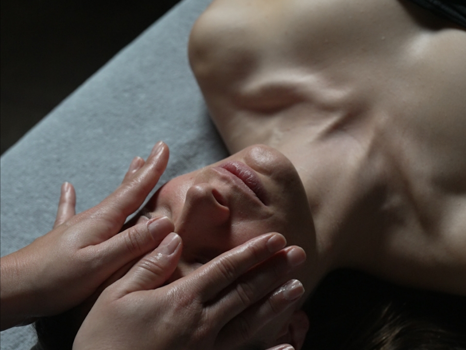 Facial massage in a relaxing spa environment 