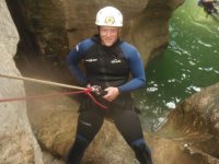  Descending into the water by rappelling 