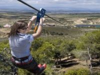  About to get carried away by the zip line 