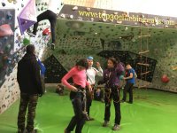  Securing harnesses before completing the climbing wall 