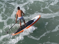  Paddling on the board 