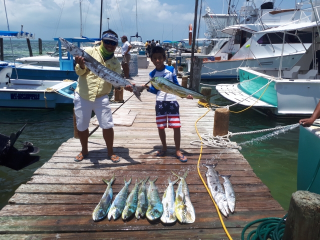 El niño con tu pesca