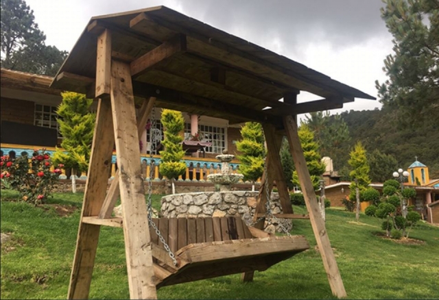 Una silla en el jardín para relajarse