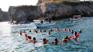 Snorkel en Isla Coral y visita guiada en Compostela 6.5hrs