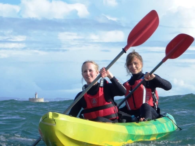 Friends riding a kayak 