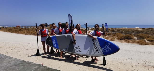 Paddle surf with friends 