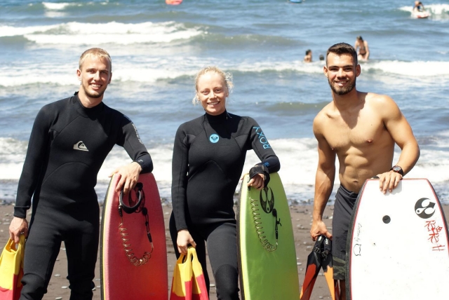  With friends surfing 