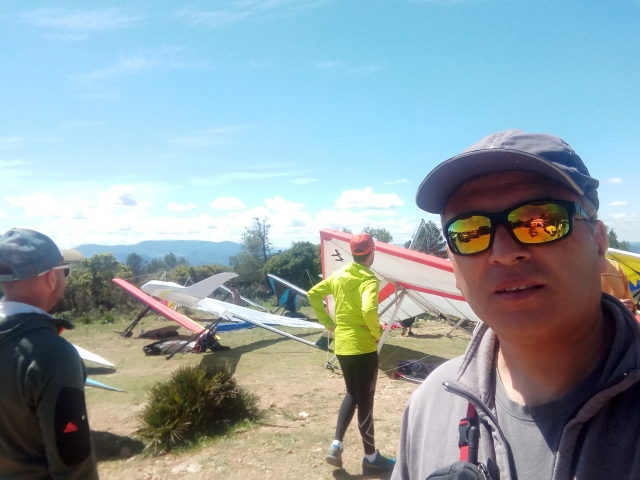 One of our instructors behind several hang gliders 