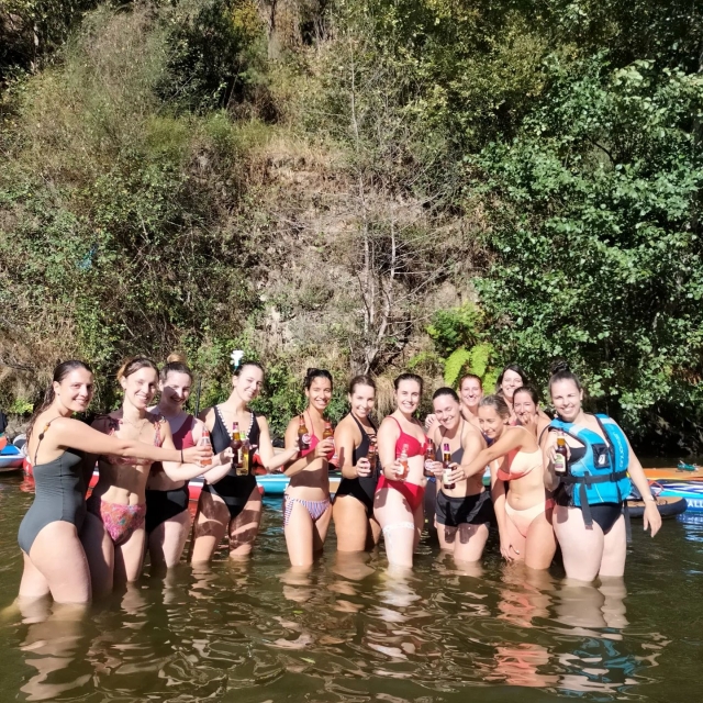  A group of friends toasting with a beer after the activity 