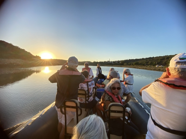  A group of people older people enjoying the views aboard our boats
