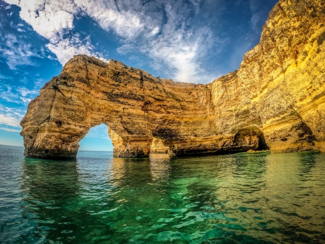  Some of the rock formations that are in the middle of the water 
