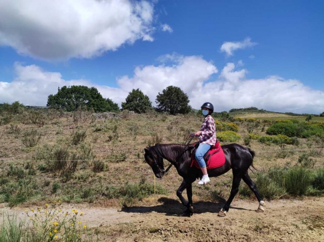 Riding on horseback 