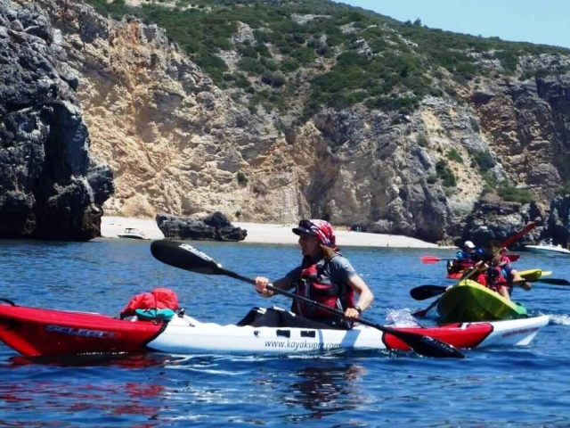  Woman on board kayaking in Sesimbra