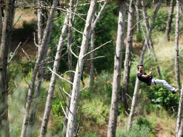  a user suspended by ropes in the middle of the course 