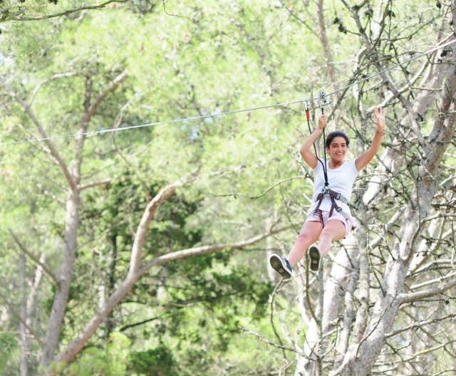  slide through the zip line while crossing all the vegetation 
