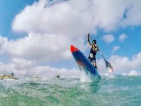 Doing paddle surf