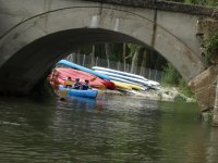  Kayak passing under the bridge 