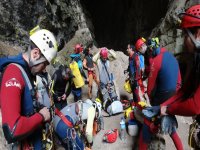  Speleologists preparing the equipment 